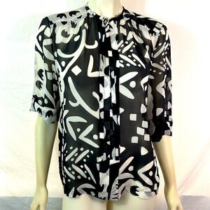 Diane Von Furstenberg black and white silk blouse, size 14